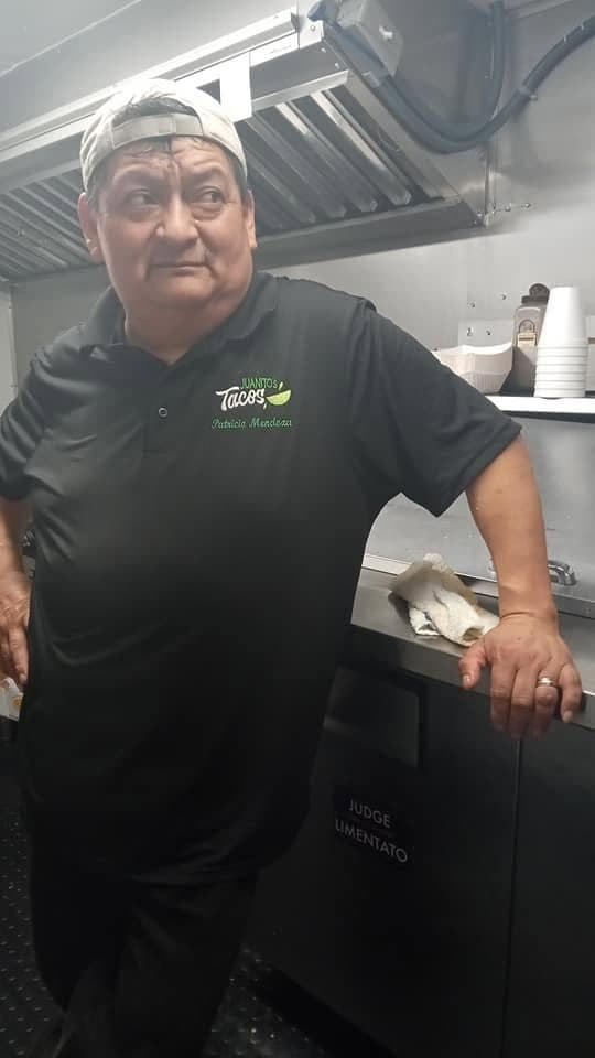 The chef at Juanito's Tacos, serving authentic Mexican street food in Urbana, Illinois