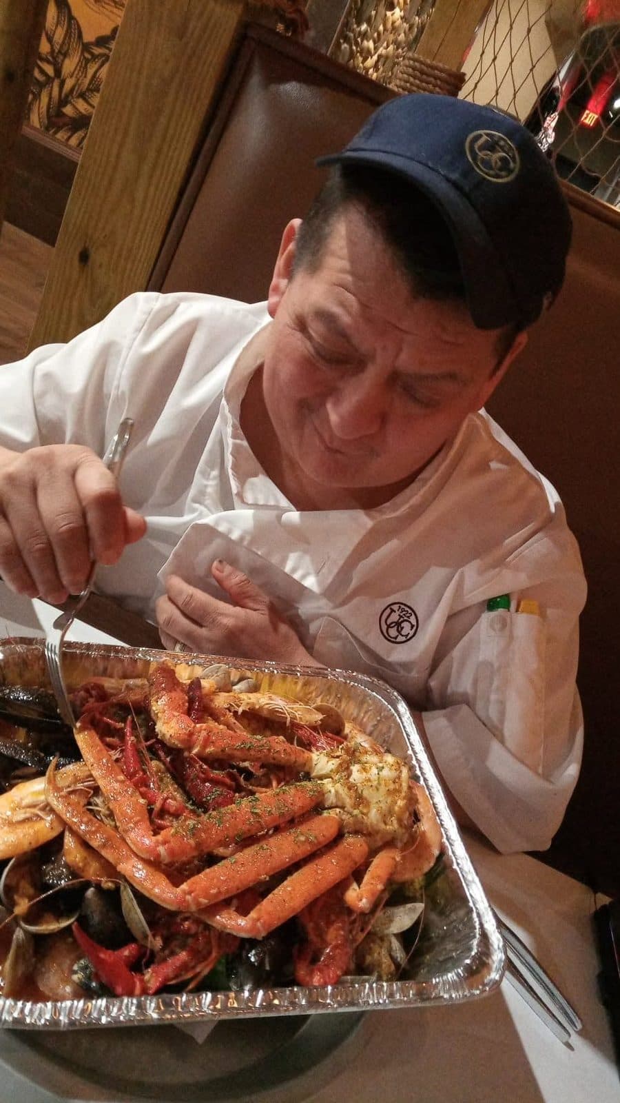 The chef at Juanito’s Tacos presenting a fresh plate of Mexican street food